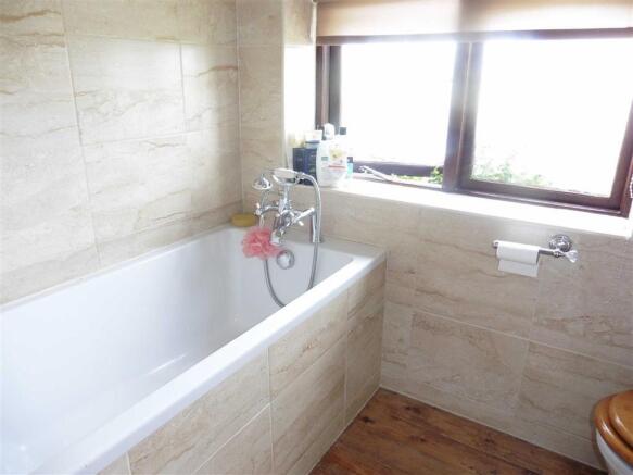 Fully tiled bathroom (side)