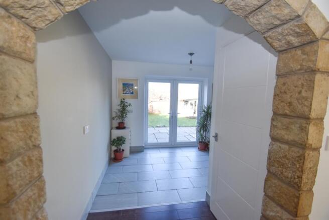 archway to utility room