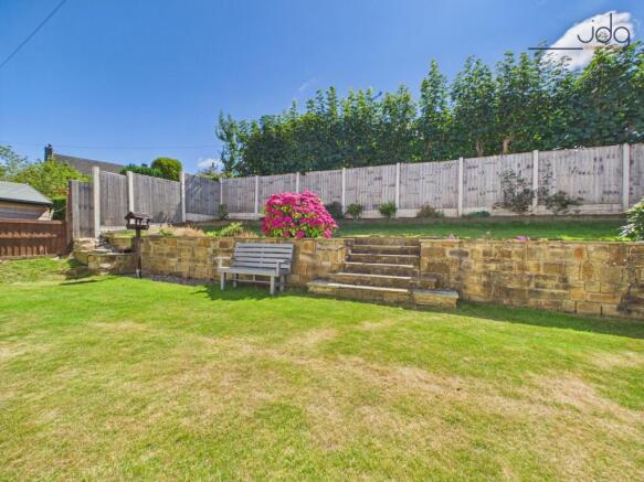 Generous Tiered Garden with Mature Planting