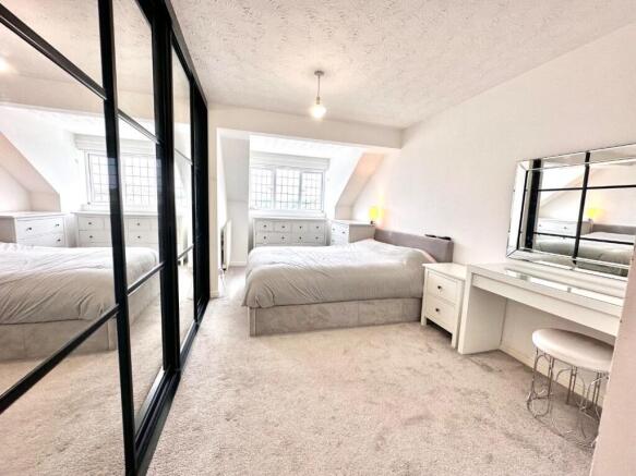 PRIMARY BEDROOM WITH EN-SUITE