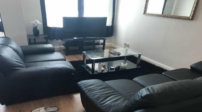 A modern and comfortable living room featuring ...