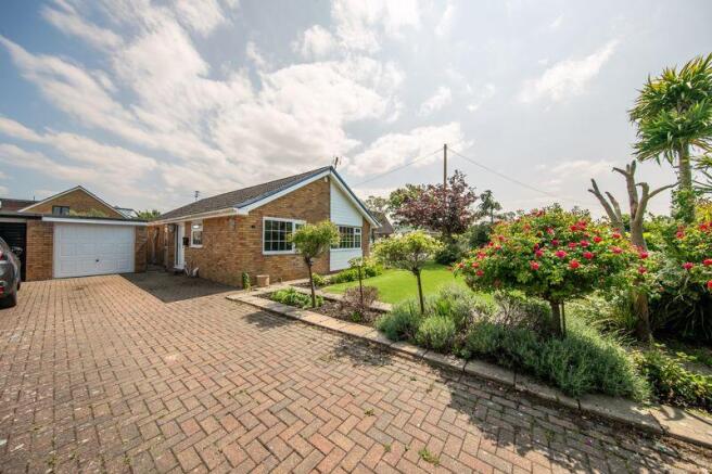Front garden, driveway & garage