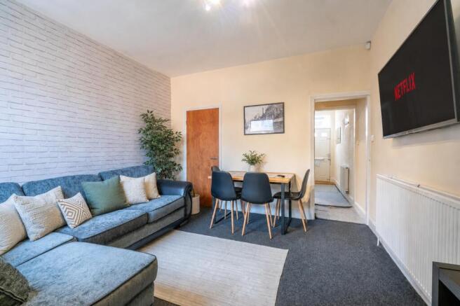 Social living area with a large corner sofa...