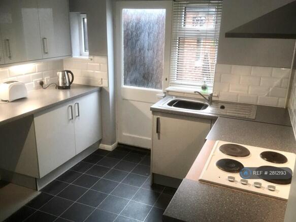Kitchen With Back Door Access