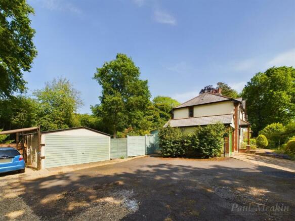 Driveway, car port and detached garage