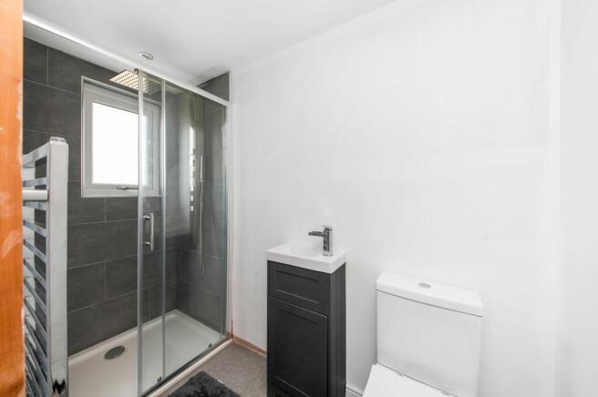 BEDROOM FOUR EN-SUITE SHOWER ROOM