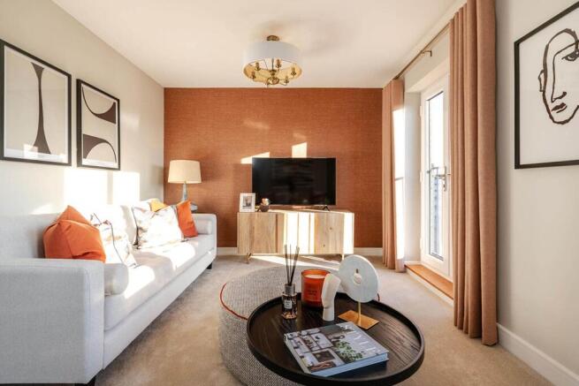 The lounge features a juliet balcony, perfect for letting in a gentle breeze in warner summer month