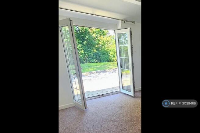 View From French Doors In Lounge
