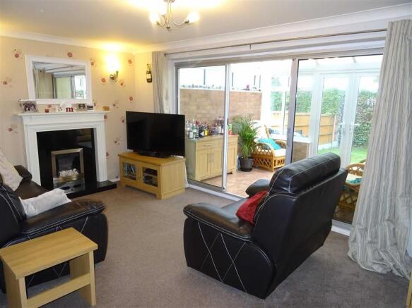 Spacious L-shaped lounge/dining room (rear)