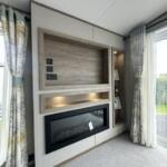 Modern Feature Fireplace And Built In Shelving In