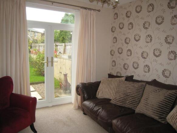 Family / Dining Room With Doors To Garden