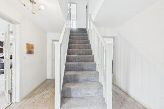 An elegant staircase in the entrance hall