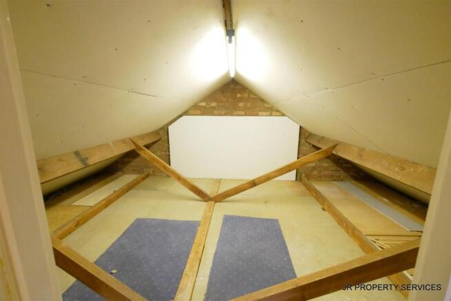 Loft/Storage Room:-