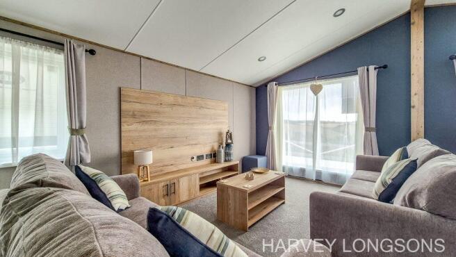 Comfortable lounge with large windows and modern f