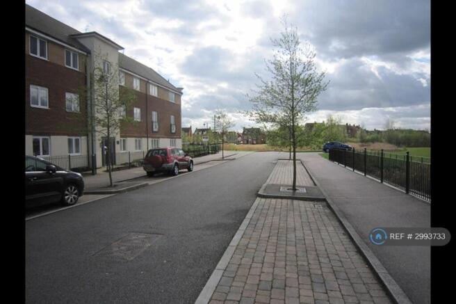 Quiet Road Leading To Gated Parking Only