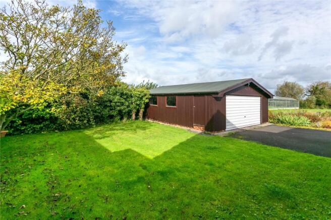 Wooden Garage/Lawn