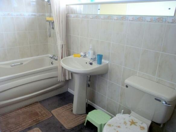 Spacious half tiled
