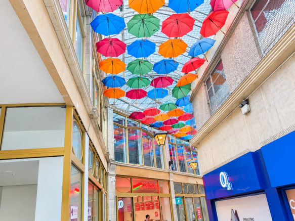 Colourful Umbrellas Beneath the Arcade Skylight.pn