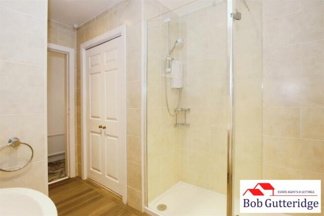 FULLY TILED SHOWER ROOM