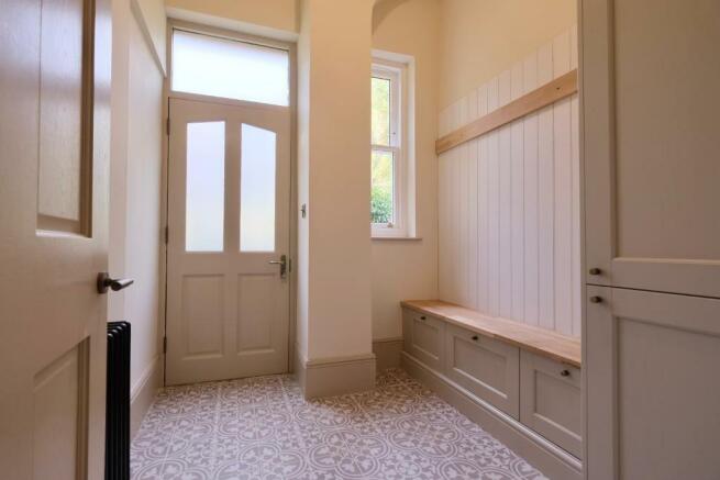 Handy boot room & rear door