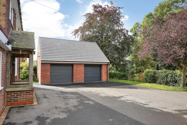 DOUBLE GARAGE & DRIVEWAY