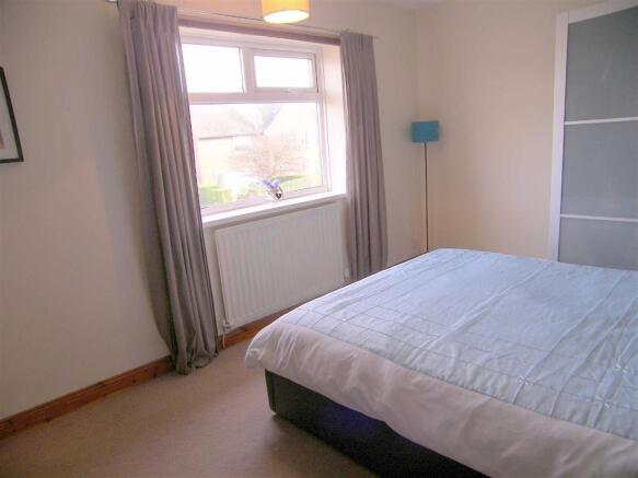 FRONT BEDROOM ONE