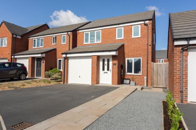 FRONTAGE, DRIVEWAY & GARAGE