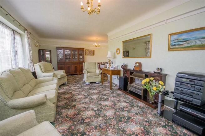 THROUGH LOUNGE/DINING ROOM