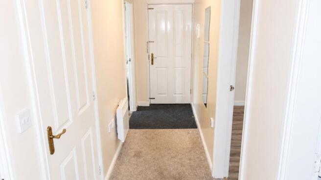 Bright and tidy entrance with neutral tones...