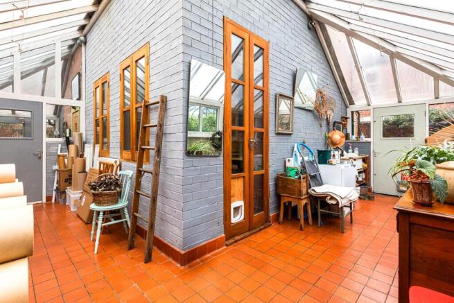 WRAP AROUND CONSERVATORY