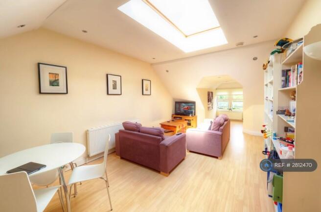 Living Room With Previous Tenant¿s Furniture