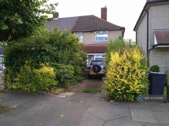 Spacious Front Yard With Parking For Two Cars