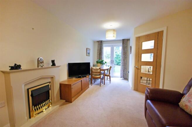 Lounge with patio door to garden