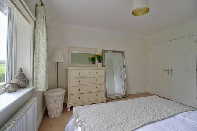 Fitted wardrobes in both bedrooms