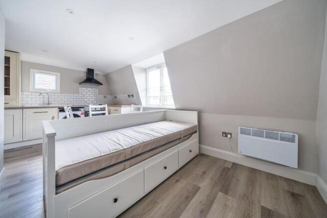 Bright, modern studio with stylish storage bed...