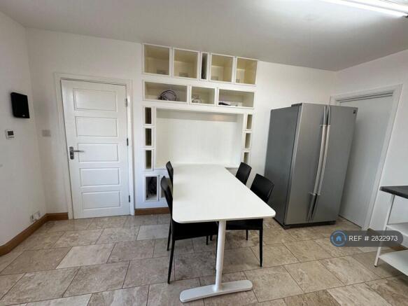 Dinging Area With American Fridge