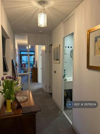 Hallway Towards Entrance And Living Room