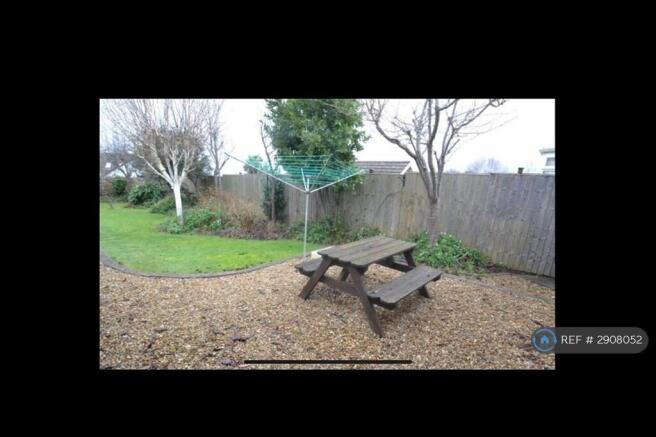 Rear Garden Seating Area By Back Door
