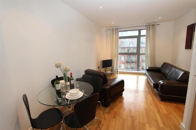 Bright modern living area with large window...