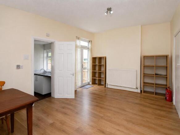 09_living_dining_room_straightened.jpg