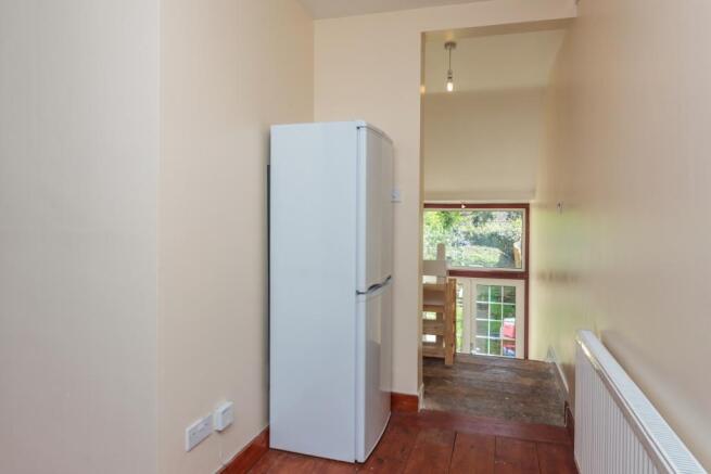 Kitchen leading to h