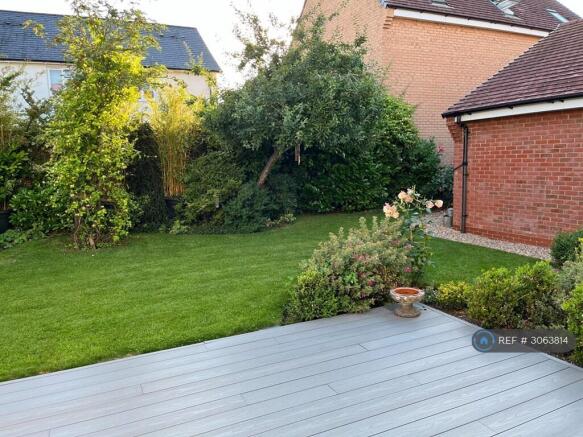Rear Garden And Decked Seating Area