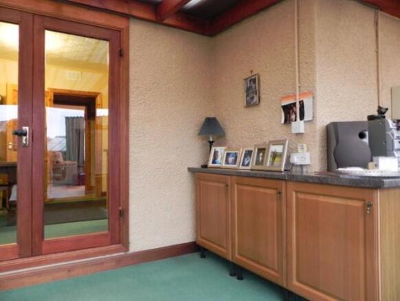 Sun lounge to kitchen [property images]