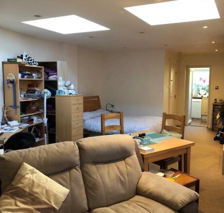Large extension leading to the kitchen.