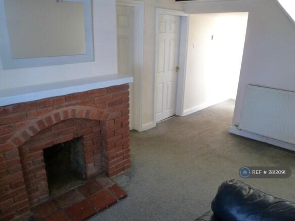 Loung Area With Settee And Central Heating