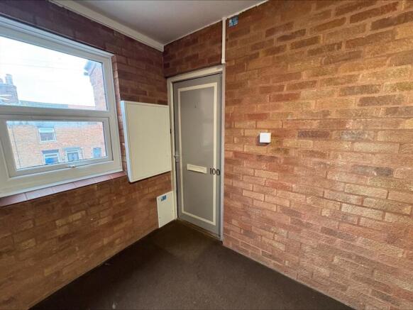 Entrance via shared stairwell