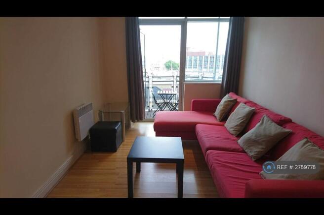 Spacious Living Room With Balcony
