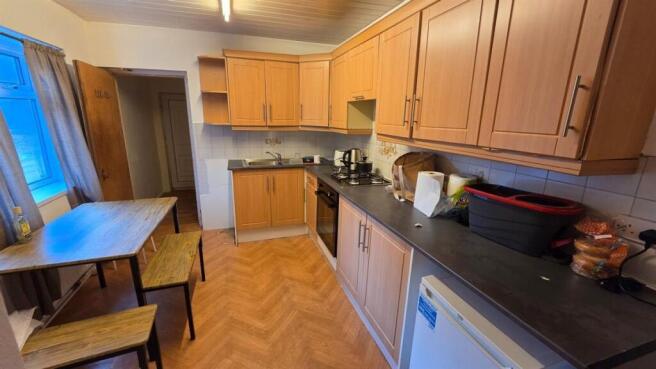 Well-appointed galley kitchen with plenty of fi...