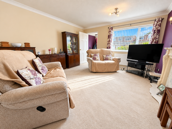 Cozy Plum-Accented Living Room.png