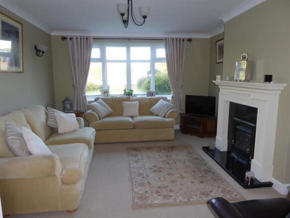 SITTING ROOM (FRONT)